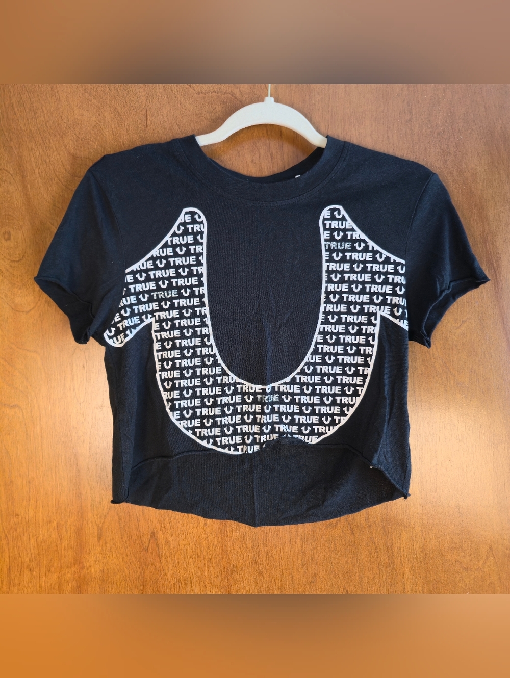 True Religion branded shirt featuring a graphic made from repeated logo Crop
